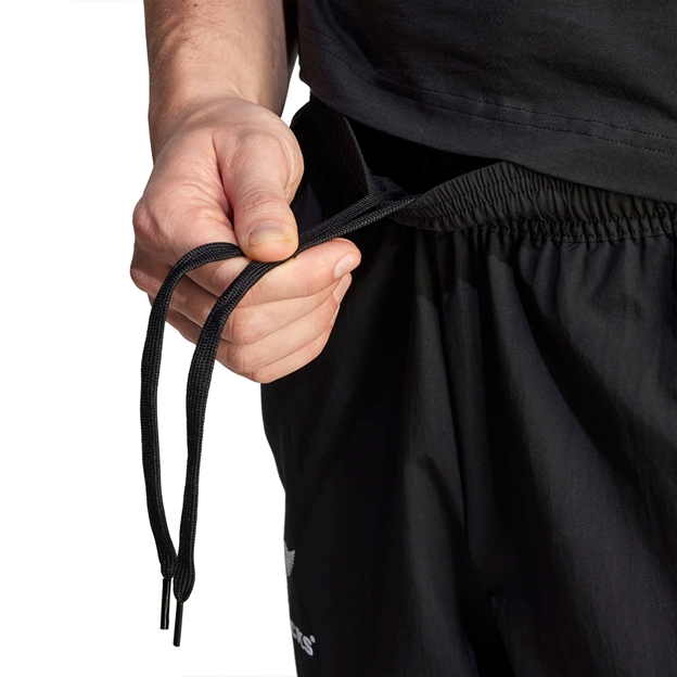 all-blacks-mens-pres-pants-black-model-waist.jpg