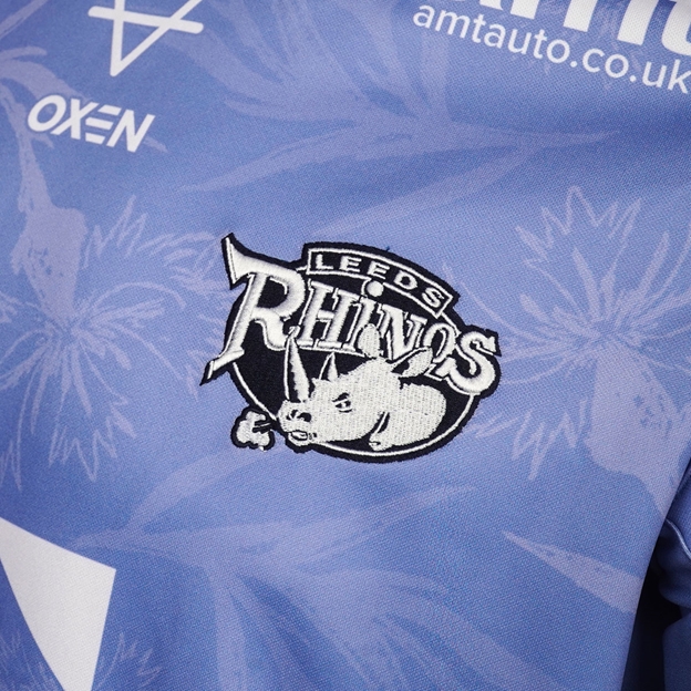 Leeds Rhinos Mens MND Rugby Shirt 2026 Frosted Blue Navy and White - Badge Close-up