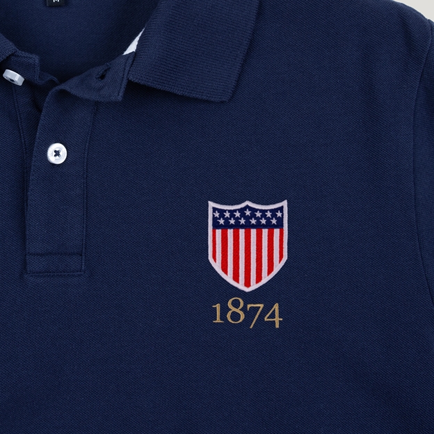 USA 1874 Adults Classic Cotton Polo Shirt Navy - Badge Close-up
