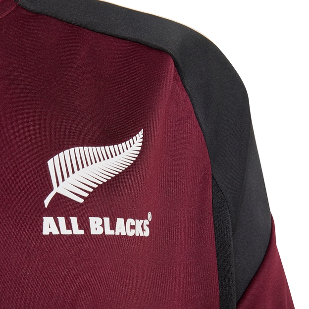 All Blacks Kids Performance T-Shirt 26/27 Maroon - Fern Close-up View