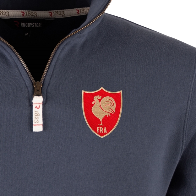 R1823 France Champions 2026 Quarter Zip Top Petrol Blue - Crest Close-up