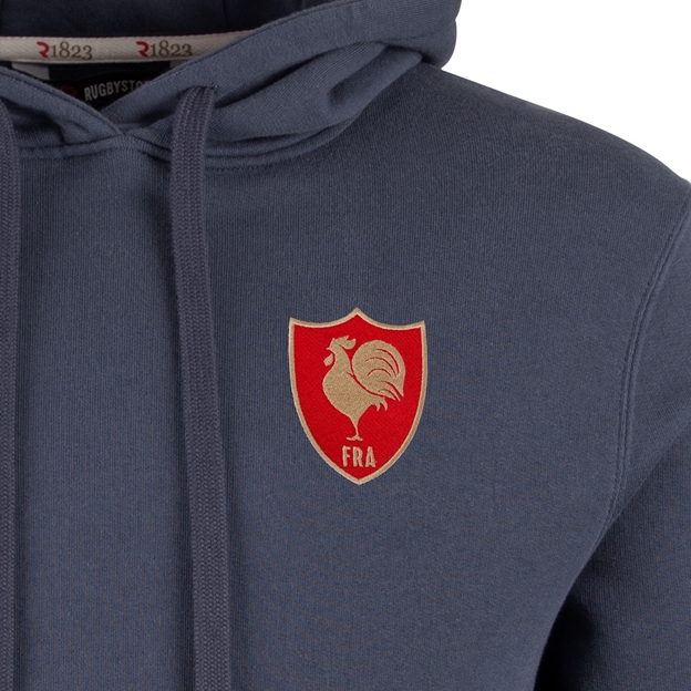 R1823 France Champions 2026 Hoodie Petrol Blue Back - Crest Close-up