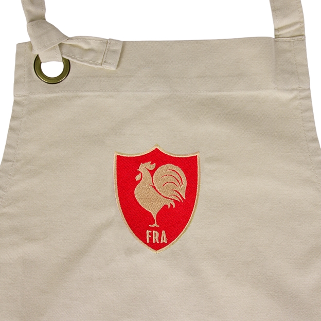 France Cotton Apron Natural - Badge Close-up